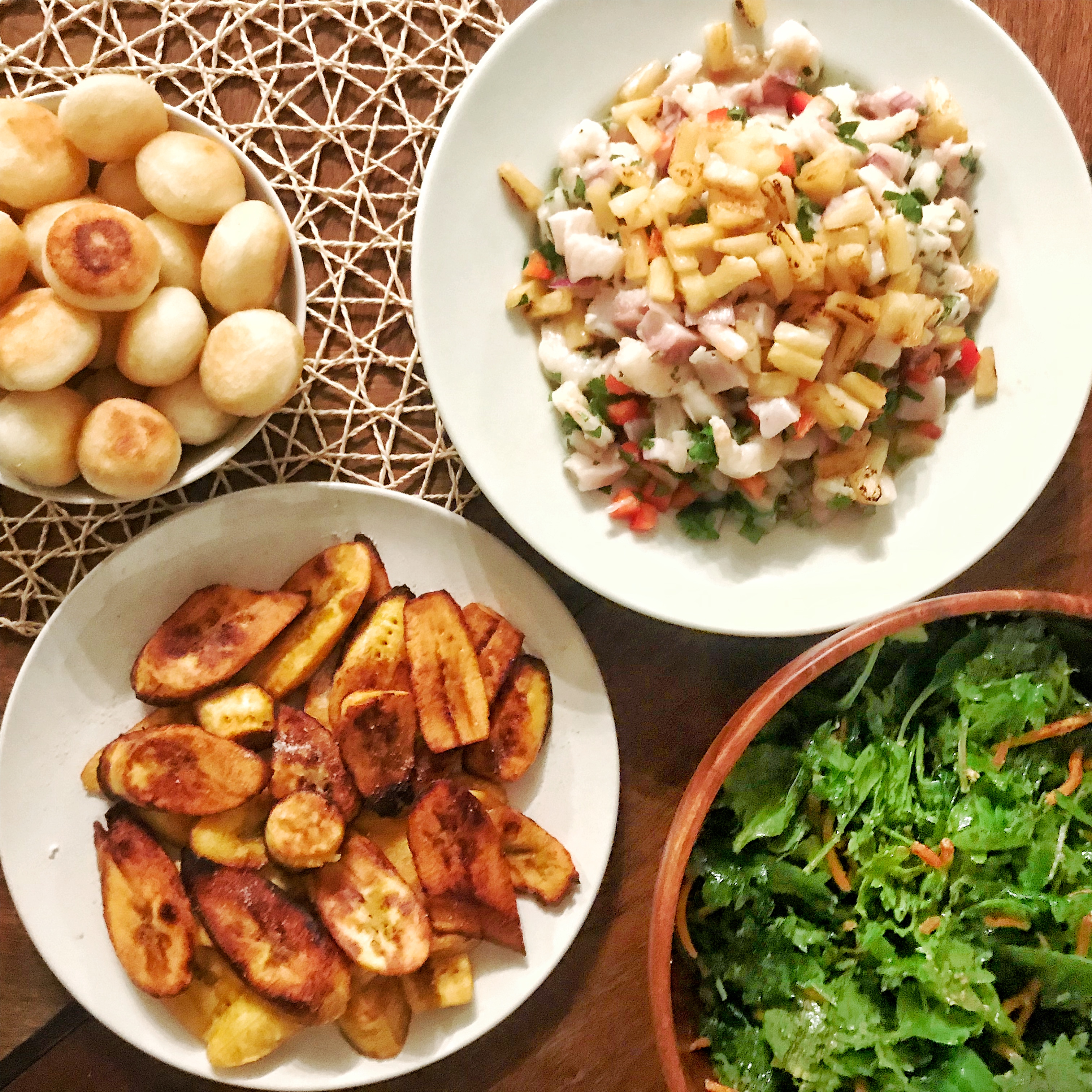 Arepas, plantains, ceviche, and salad.
