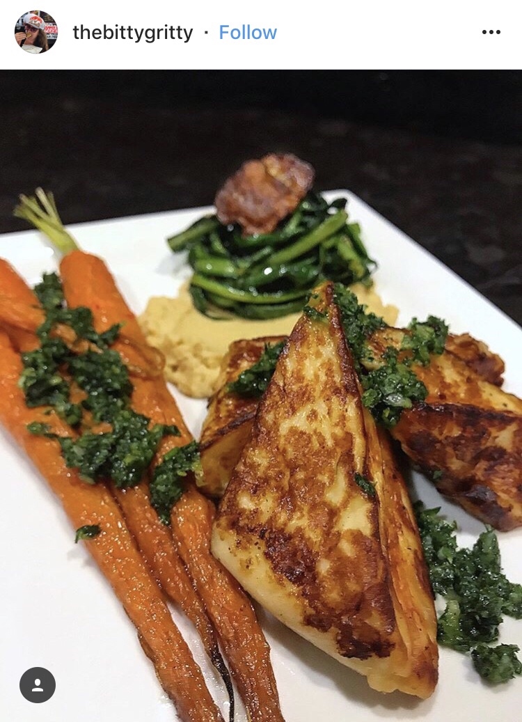 An Instagram post from thebittygritty showing grilled haloumi and vegetables.