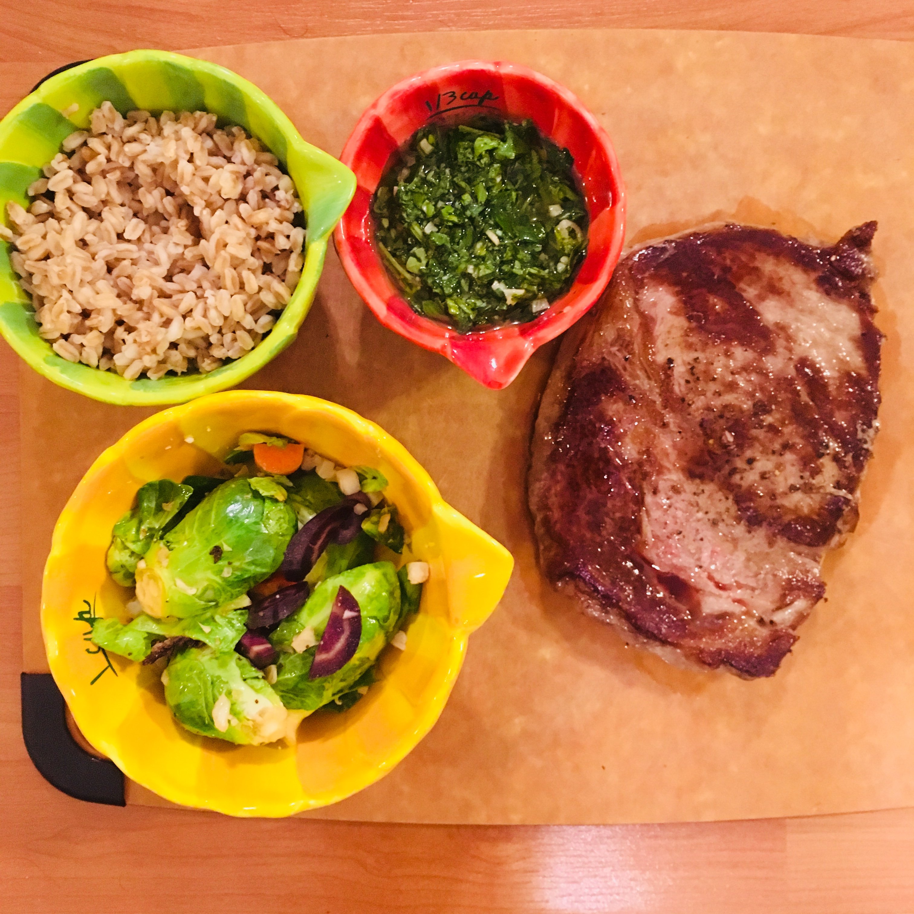 Steak chimichurri with farro and veggies.