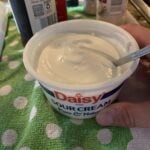 An open container of sour cream