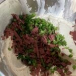 Diced beef and green onions in the sour cream and cream cheese mixture