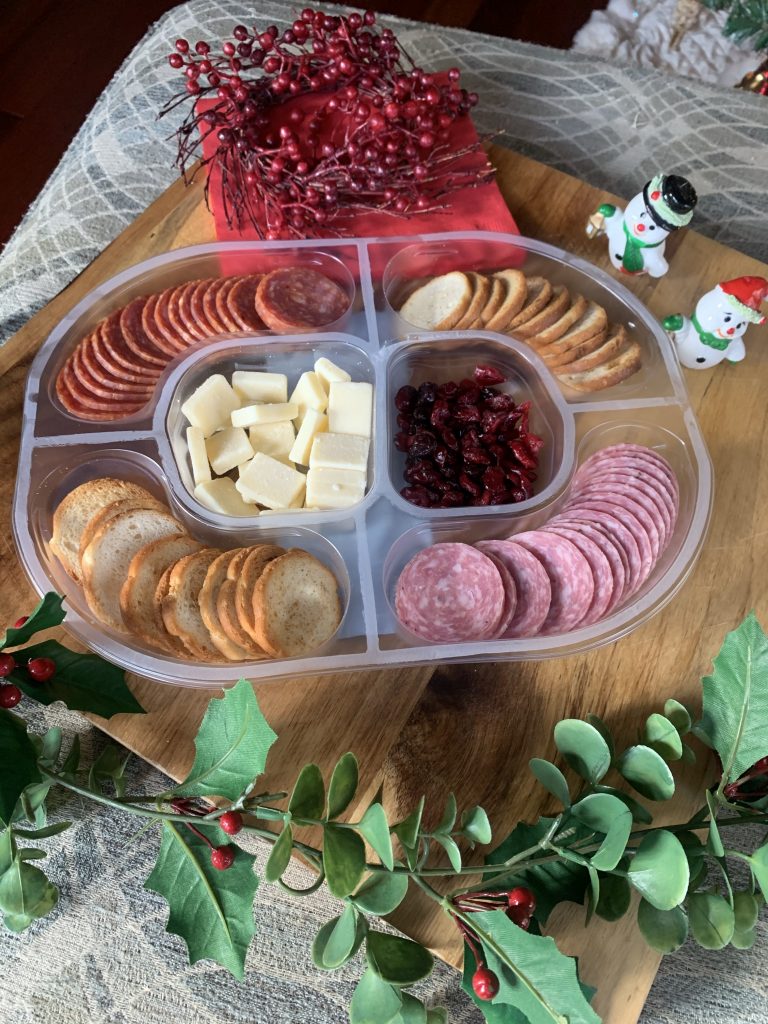 Another angle of the social platter surrounded by holiday decorations