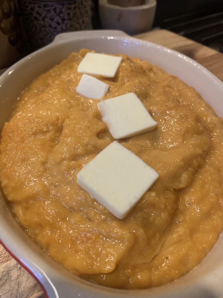Sweet potato casserole with butter before baking.
