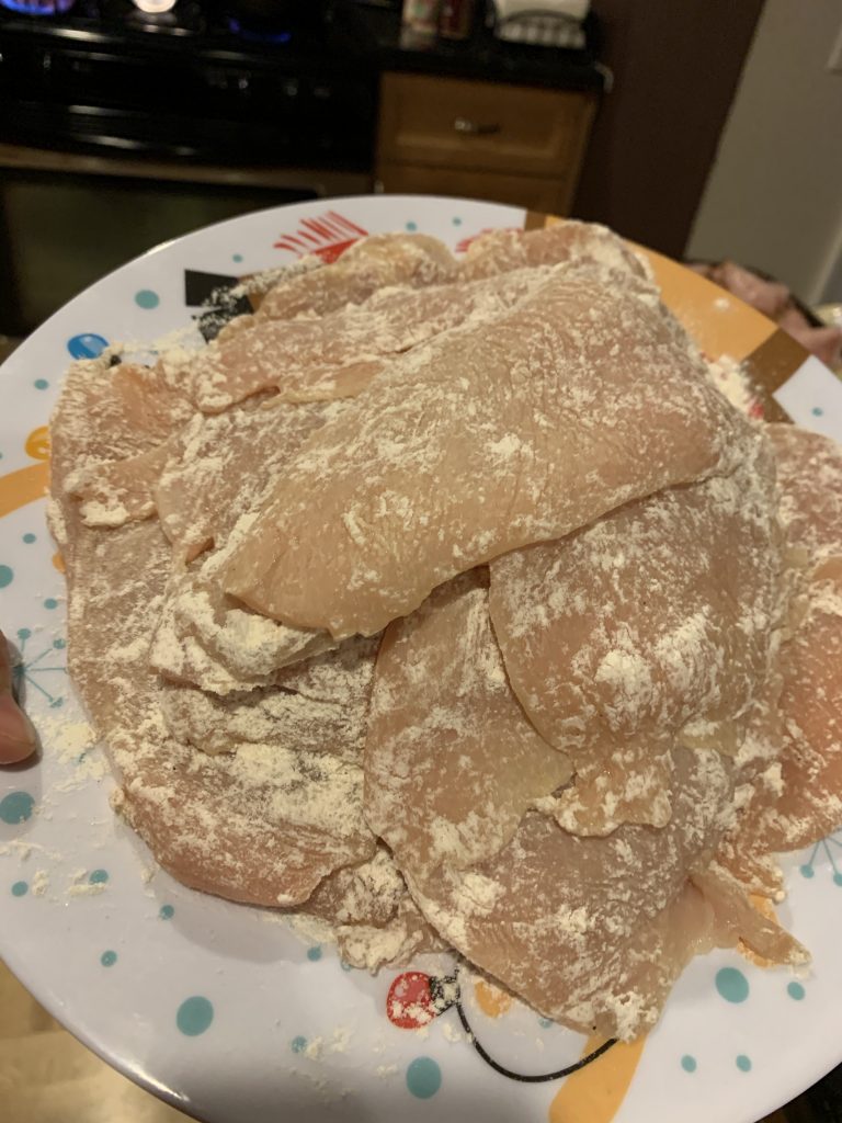 Floured chicken cutlets