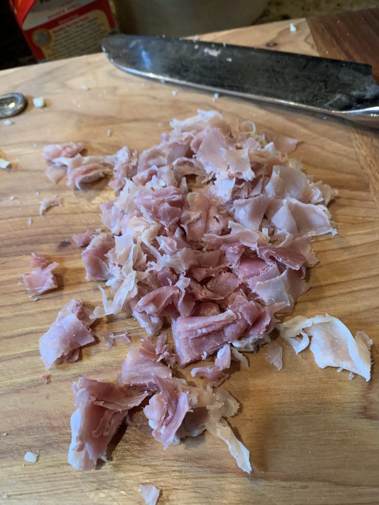 Chopped up pieces of prosciutto