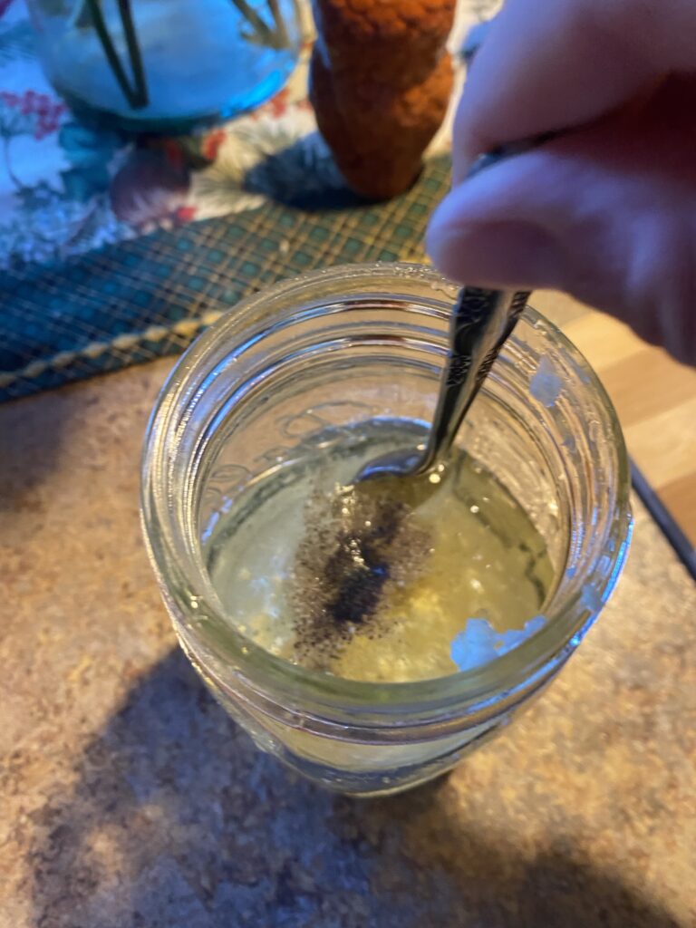 A jar of lemon garlic dressing