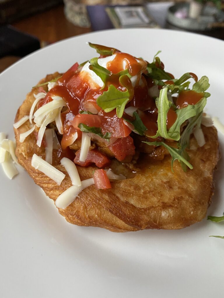 A finished Puffy Chicken Taco