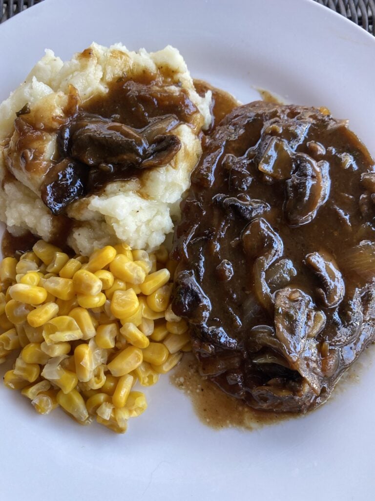 Baked Steak With Mushroom Gravy and corn