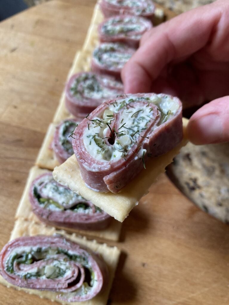 Salami roll ups on crackers