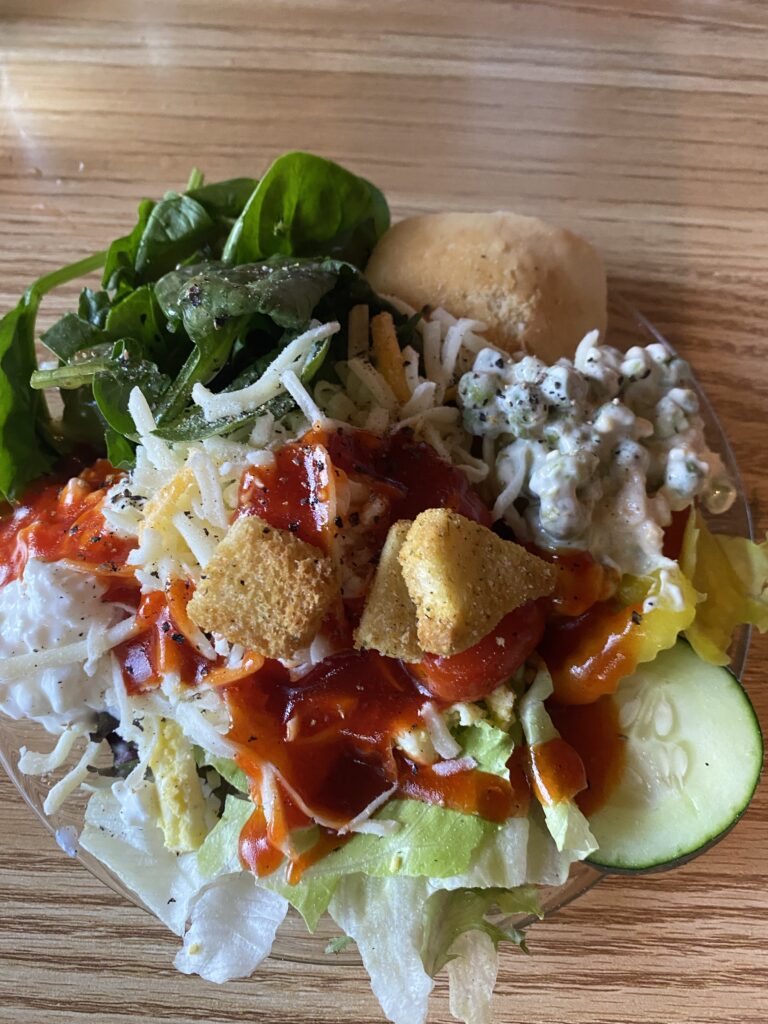 A salad with all manner of toppings