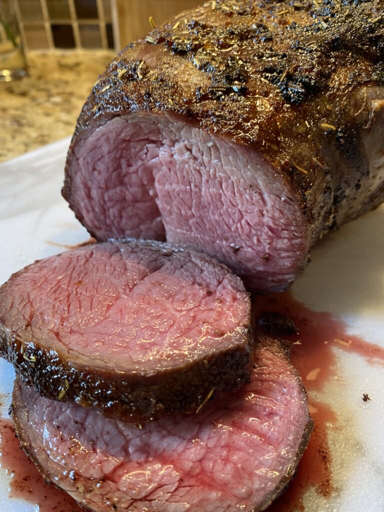 Sliced, rare beef chuck roast