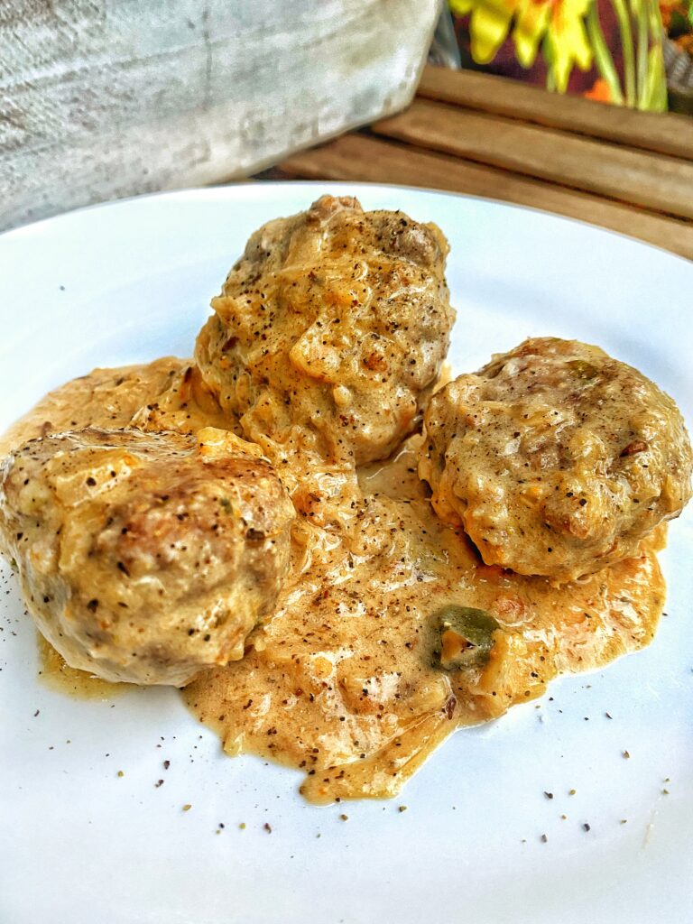 A close up of the finished meatballs in sauce