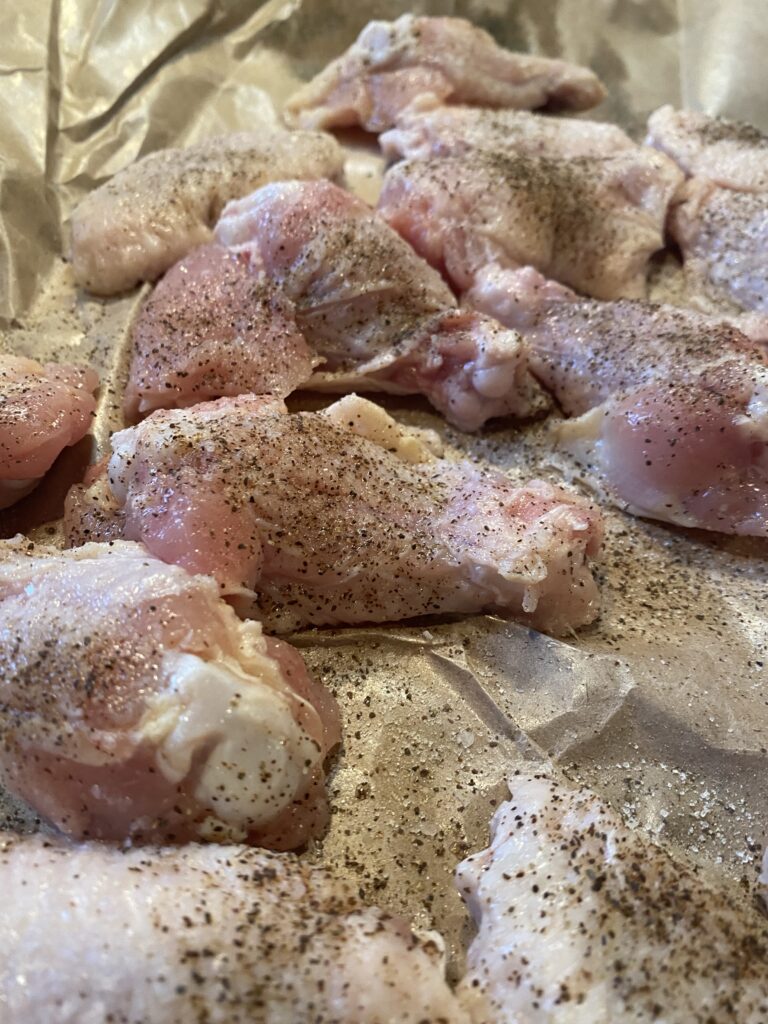 Seasoned raw chicken wings