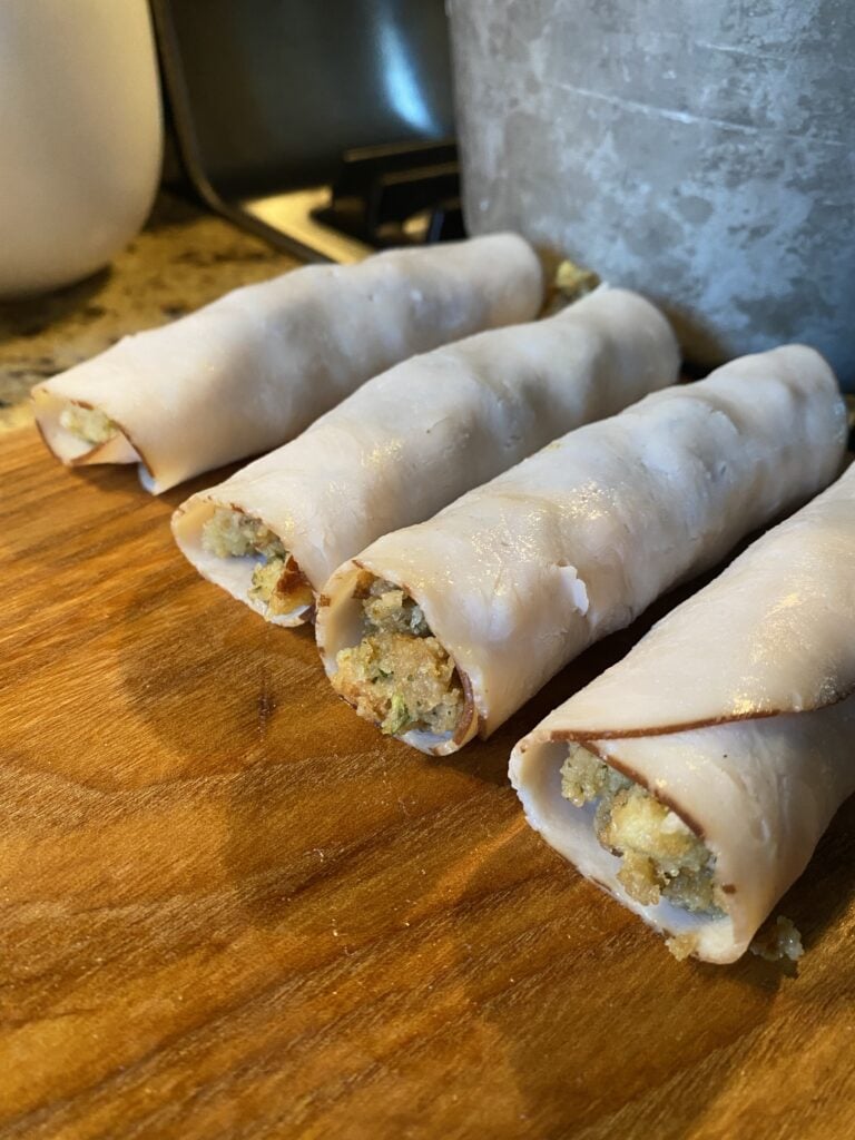 Dei turkey slices wrapped around stuffing