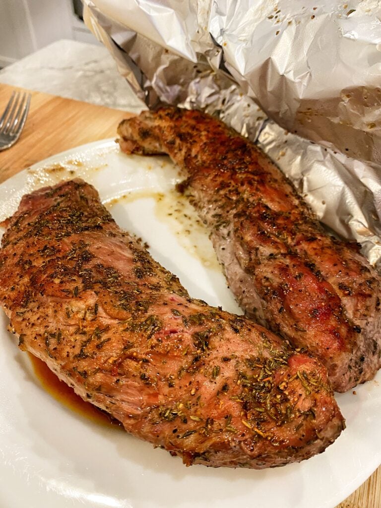 Two cooked pork tenderloins
