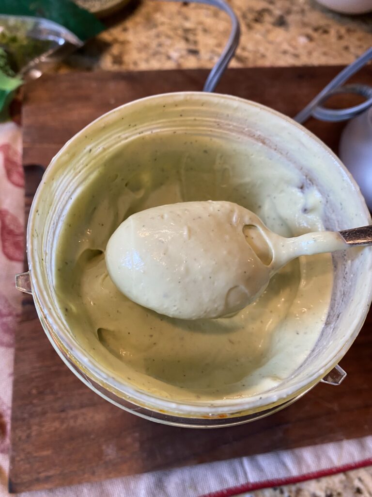 A spoon of the salad dressing