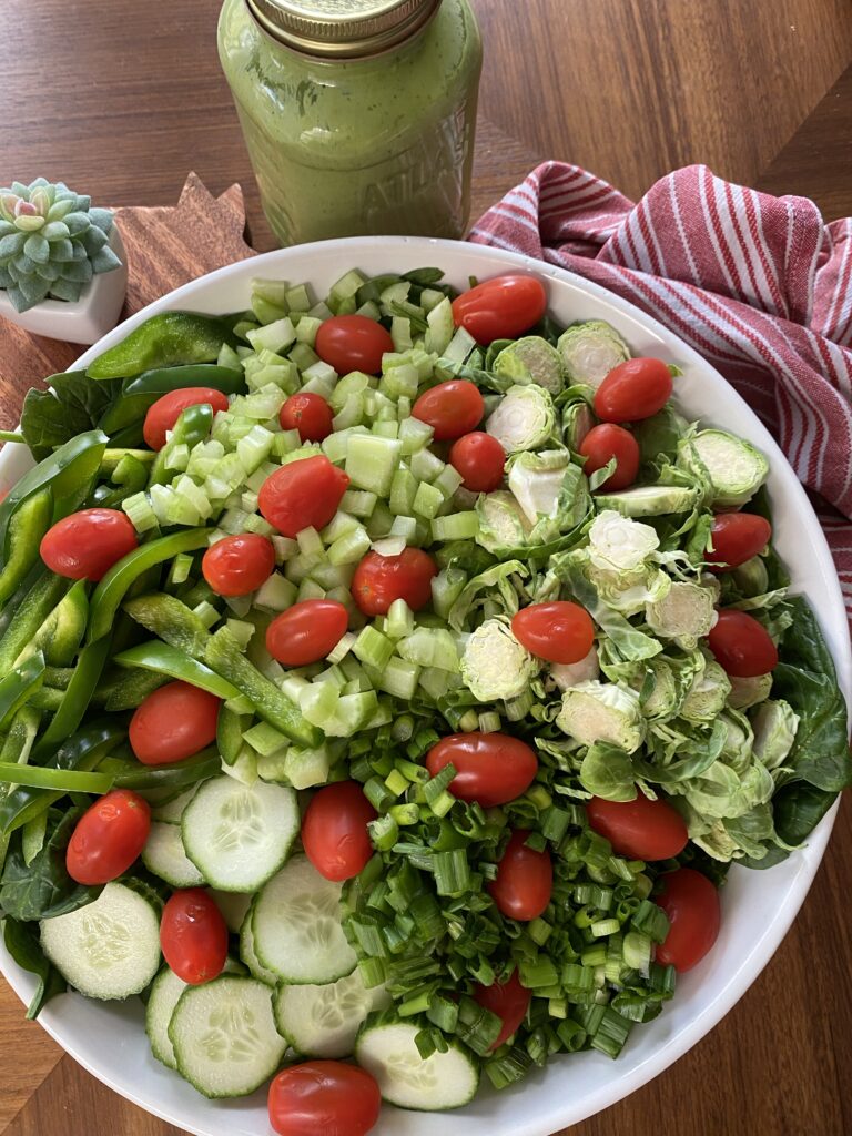 The big green salad with cherry tomatoes throughout