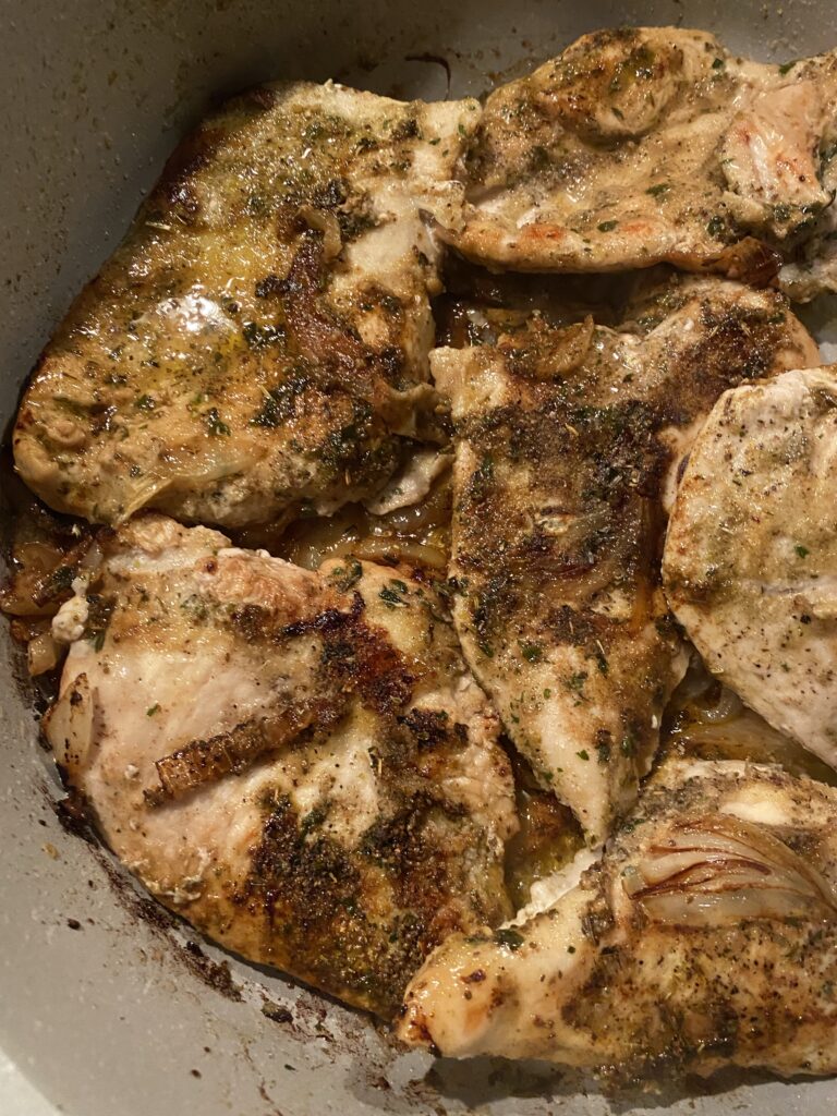 Chicken cooking in a pot