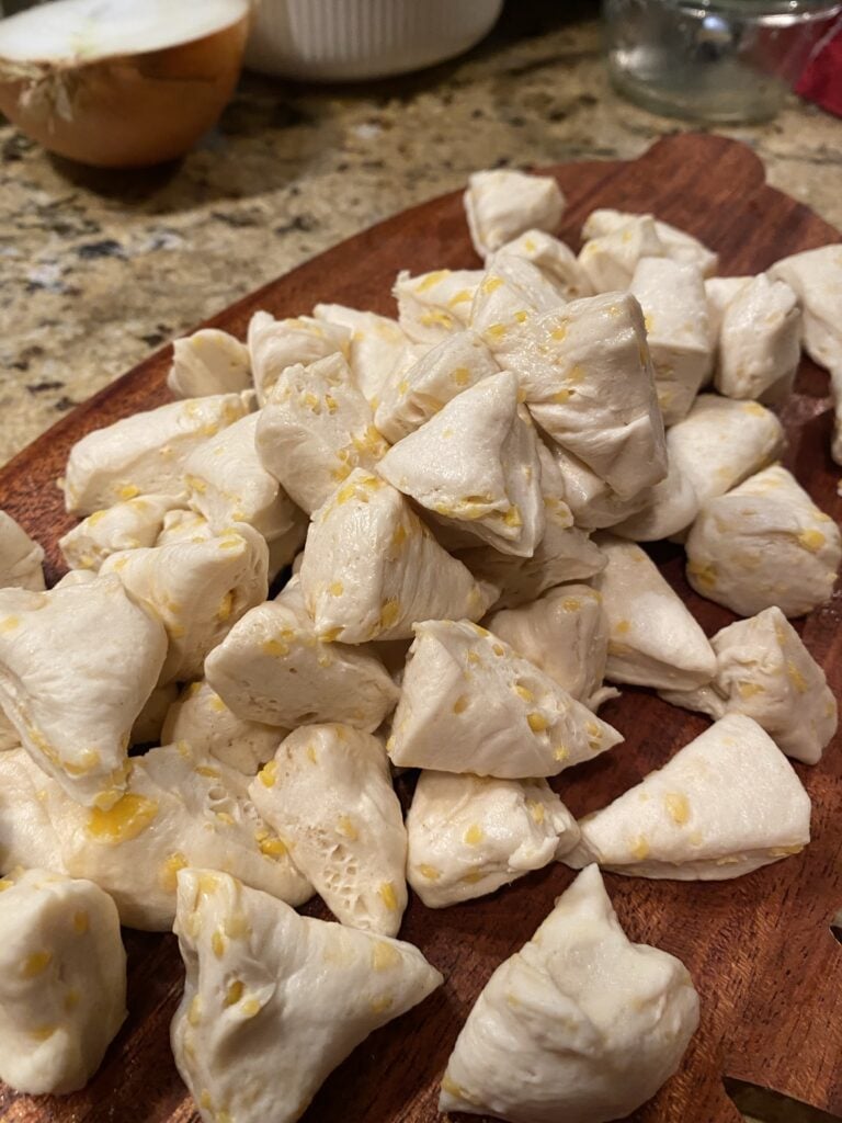 Biscuit dough cut into pieces