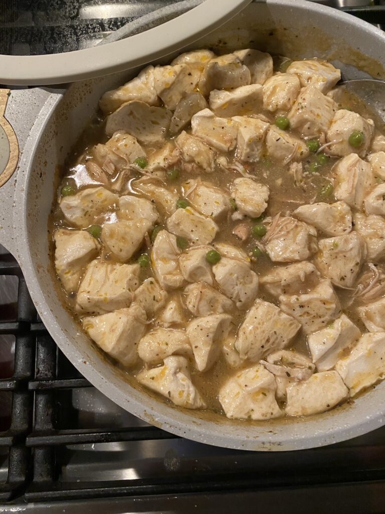 Chicken and dumplings cooking in the pot