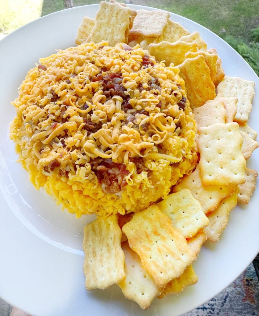 The cheeseball surrounded by crackers