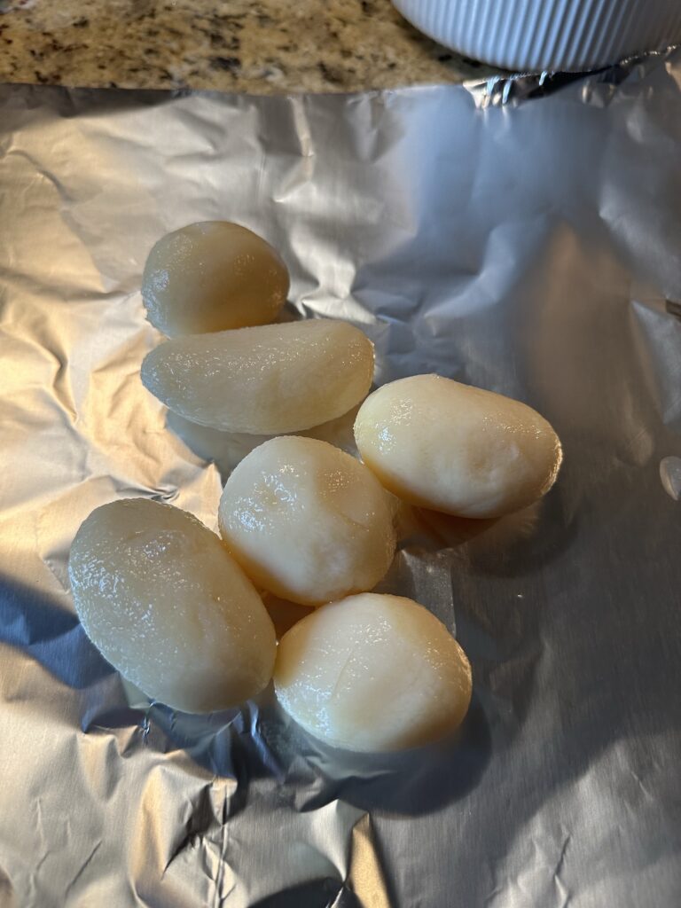 Potatoes on foil