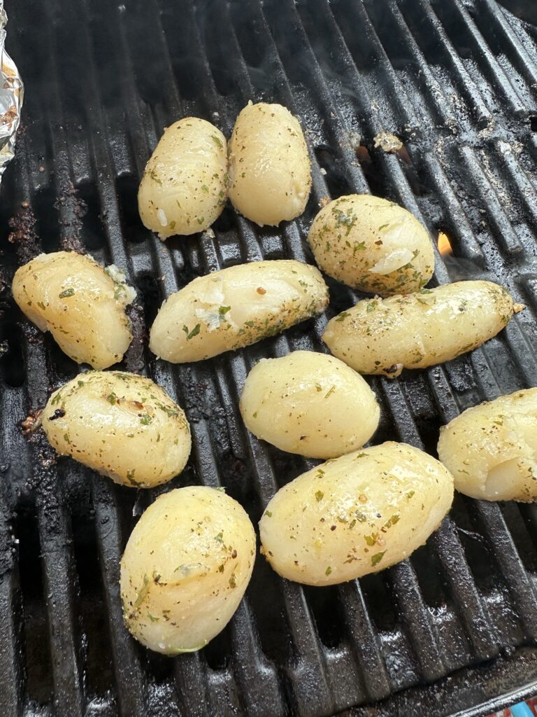 Steamed potatoes on the grill