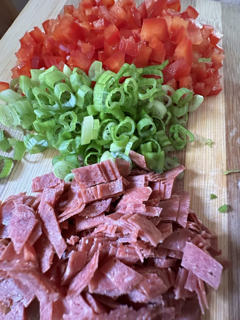 Diced dried beef, green onions, and tomatoes