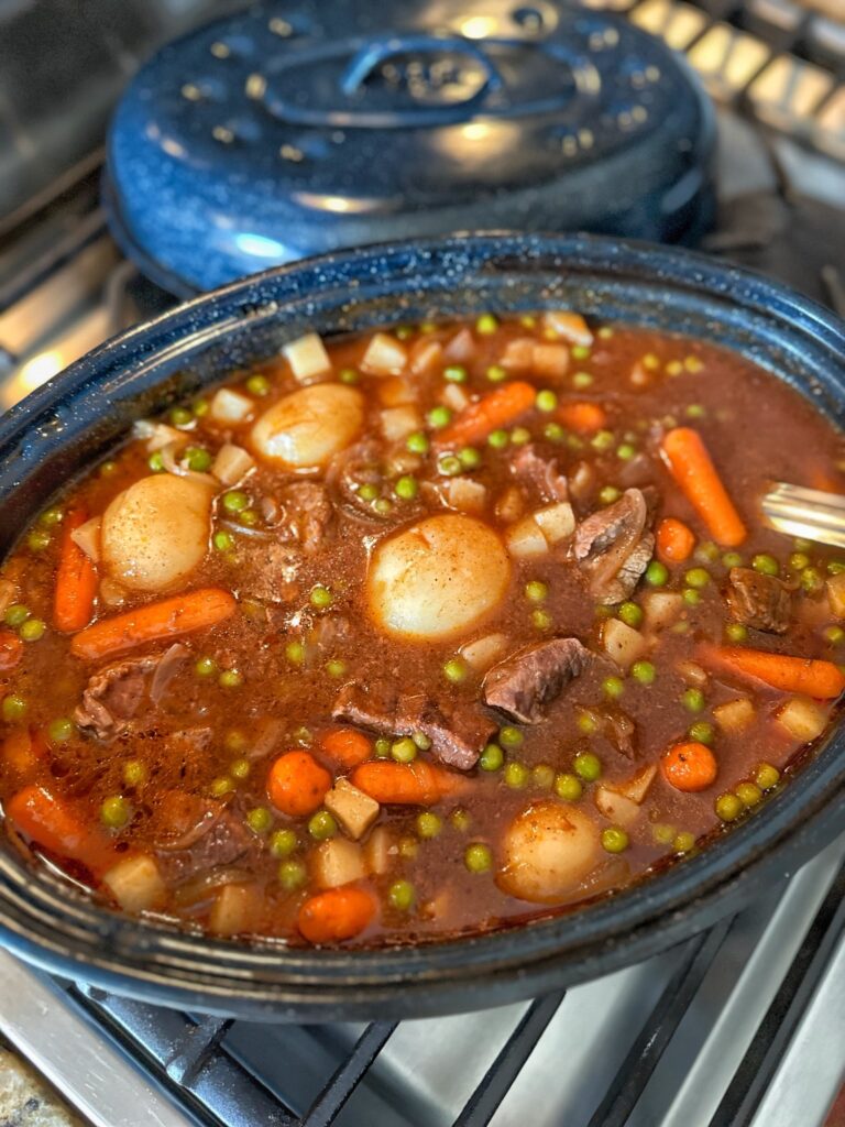 The finished classic beef stew in a roaster