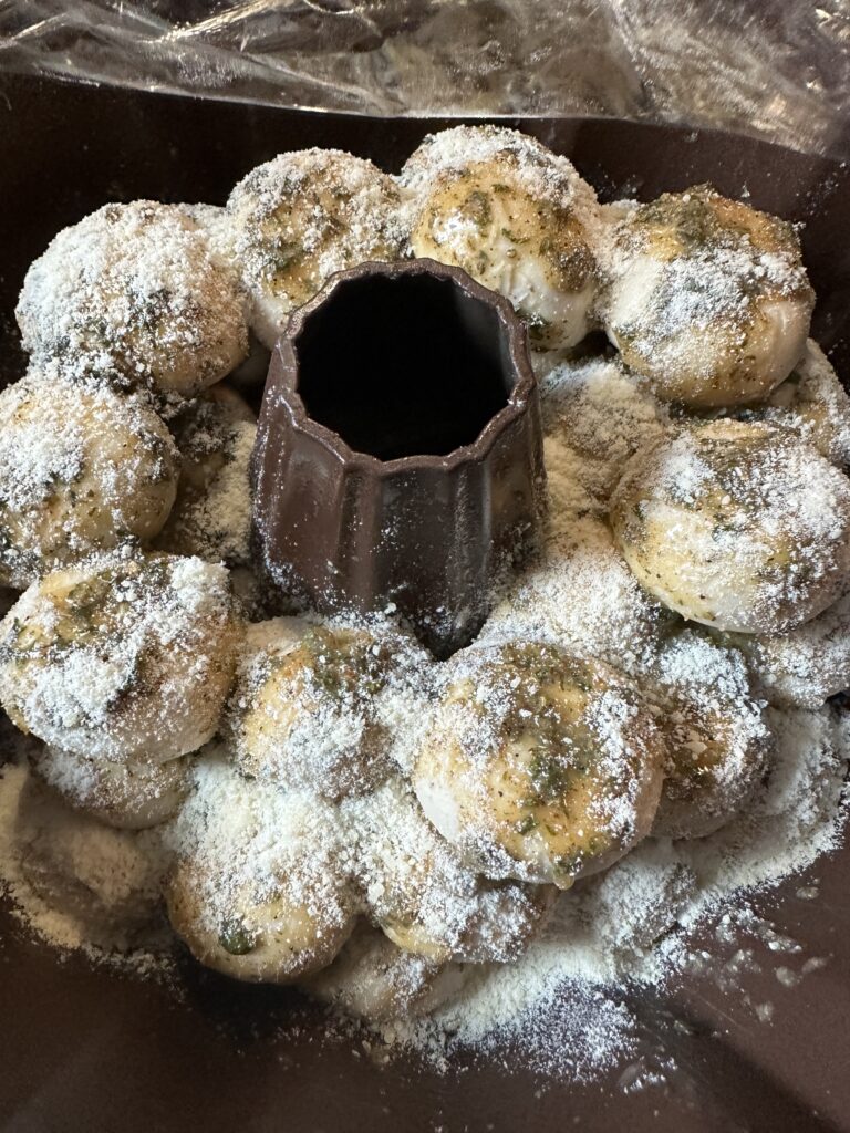 The seasoned rolls before rising