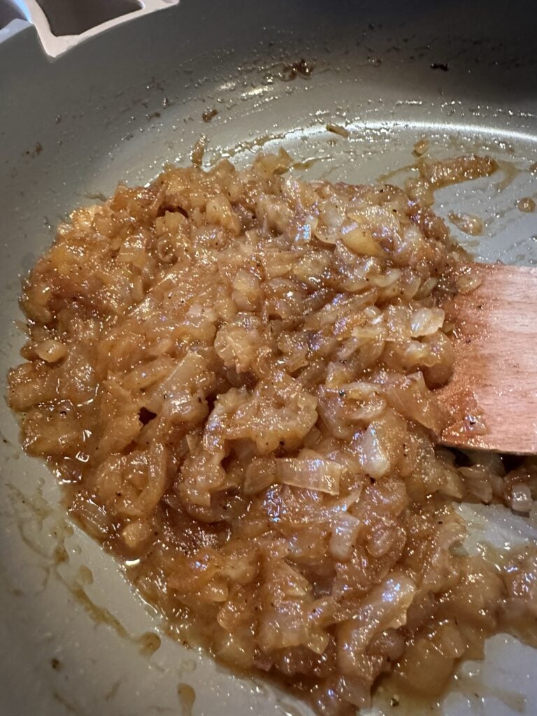 Onions sizzling in a pan
