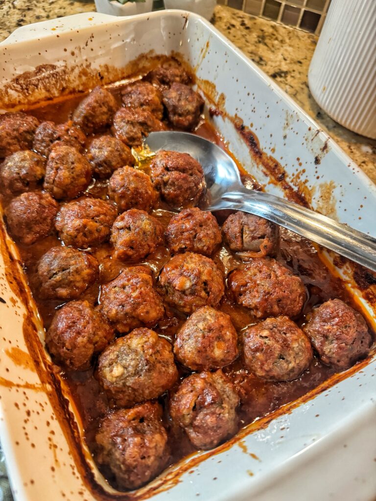 The finished ham balls in a baking dish