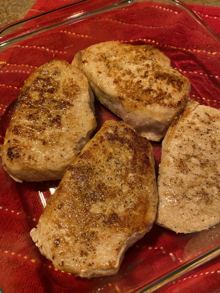 Thick boneless pork chops seasoned for French Onion Pork Chops