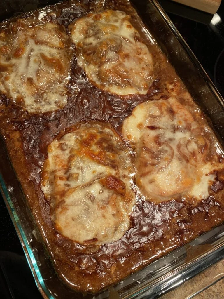 Baked French Onion Pork Chops smothered in onion gravy and provolone