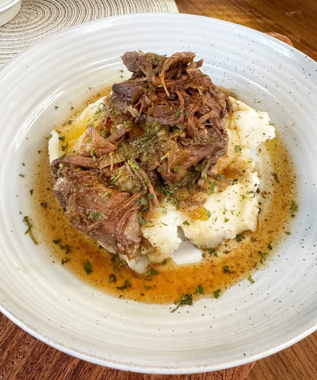 Country Style Beef with Onion Au Jus over Potatoes
