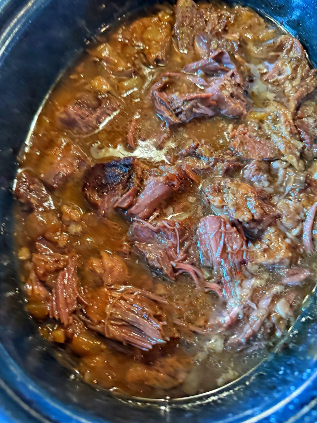 The simmering country ribs in jus