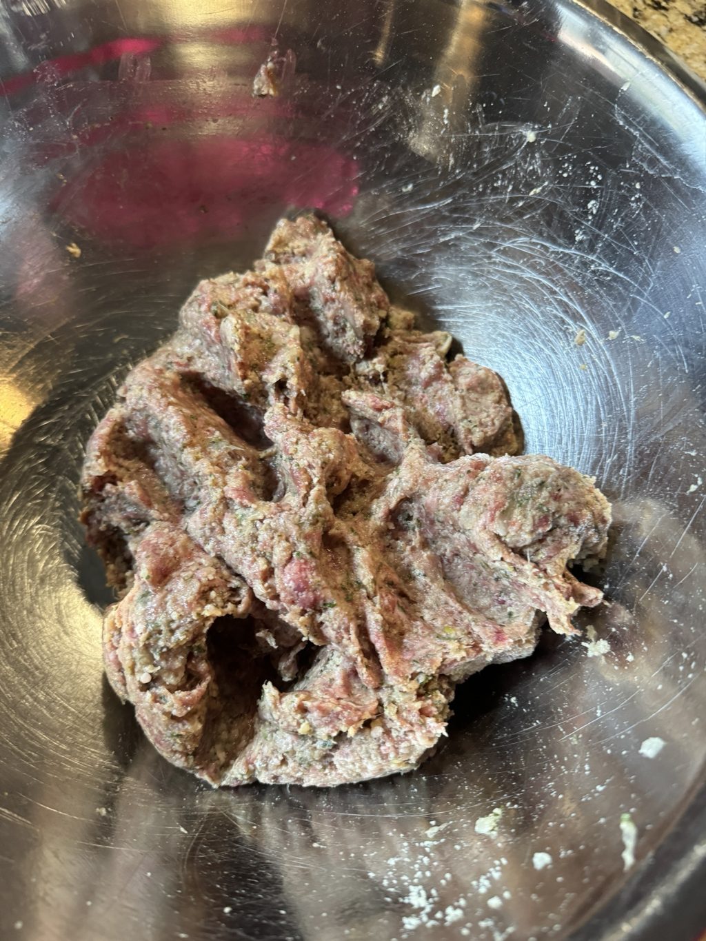 The meatball mixture in a bowl