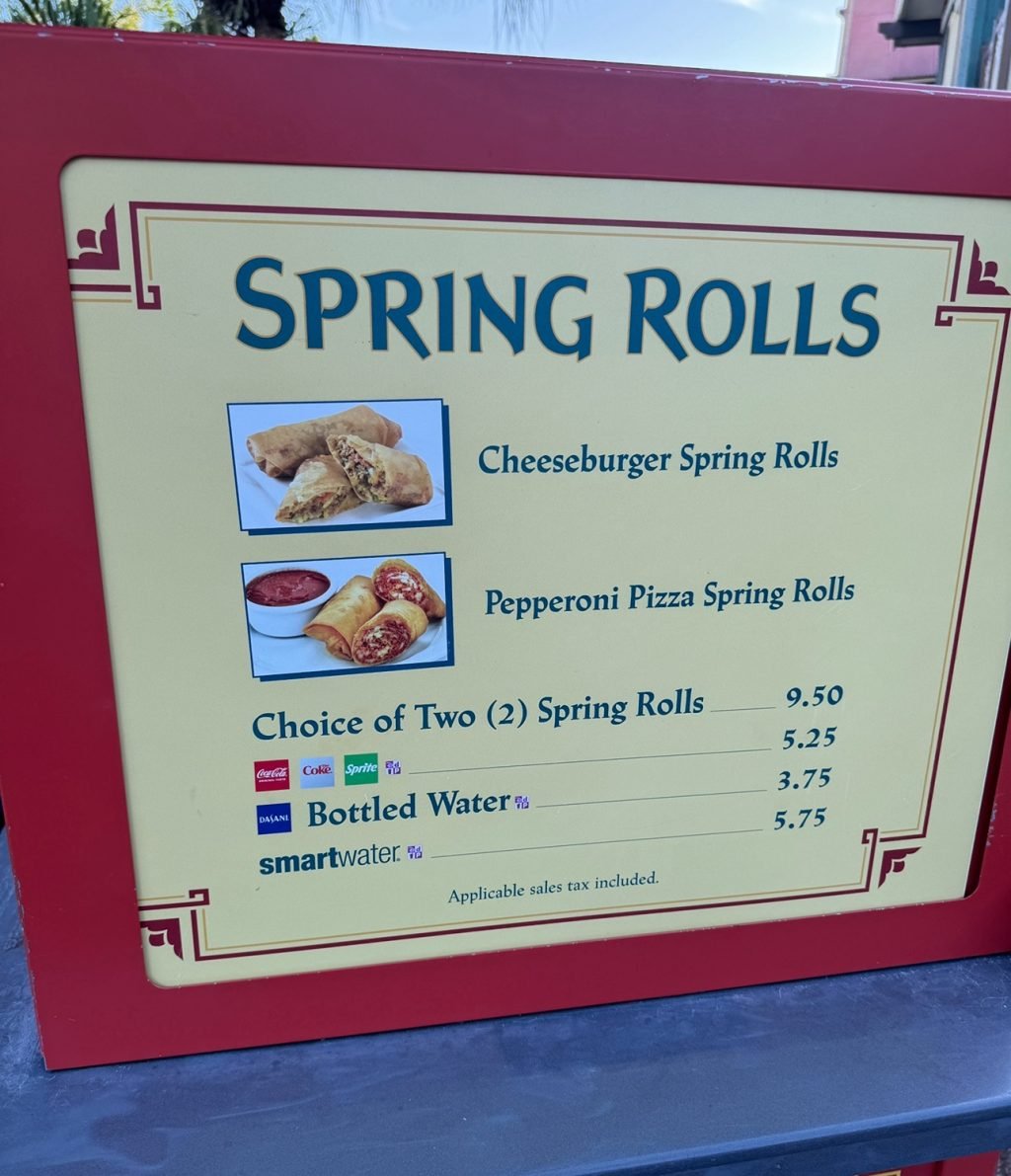 A menu sign for Cheeseburger Spring Rolls and Pepperoni Pizza Spring Rolls
