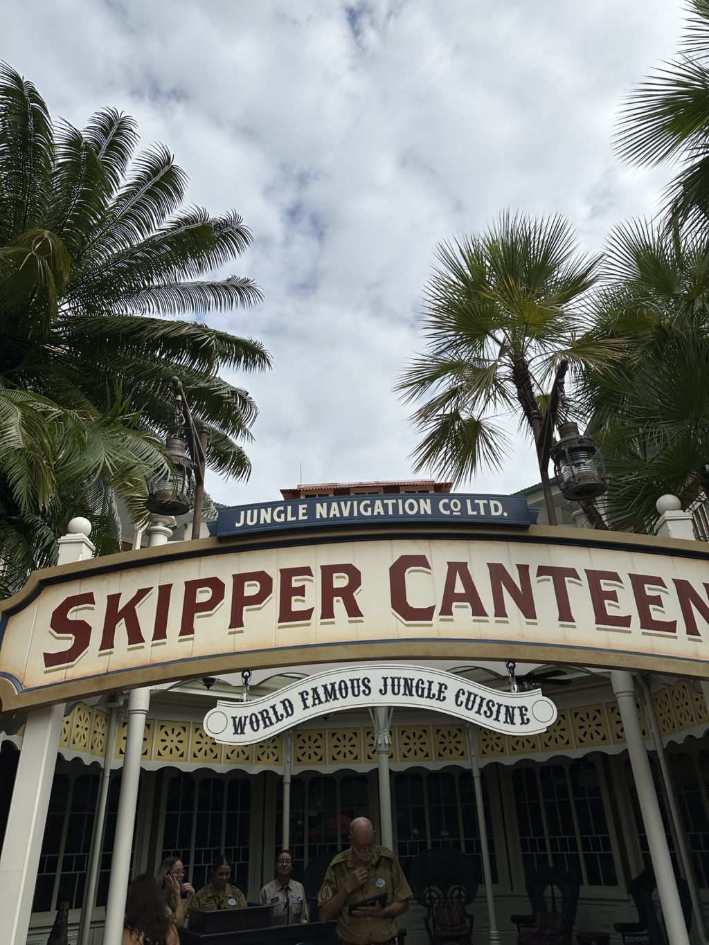 The sign for the Jungle Navigation Co Skipper Canteen, the slogan "World Famous Jungle Cuisine" hangs below