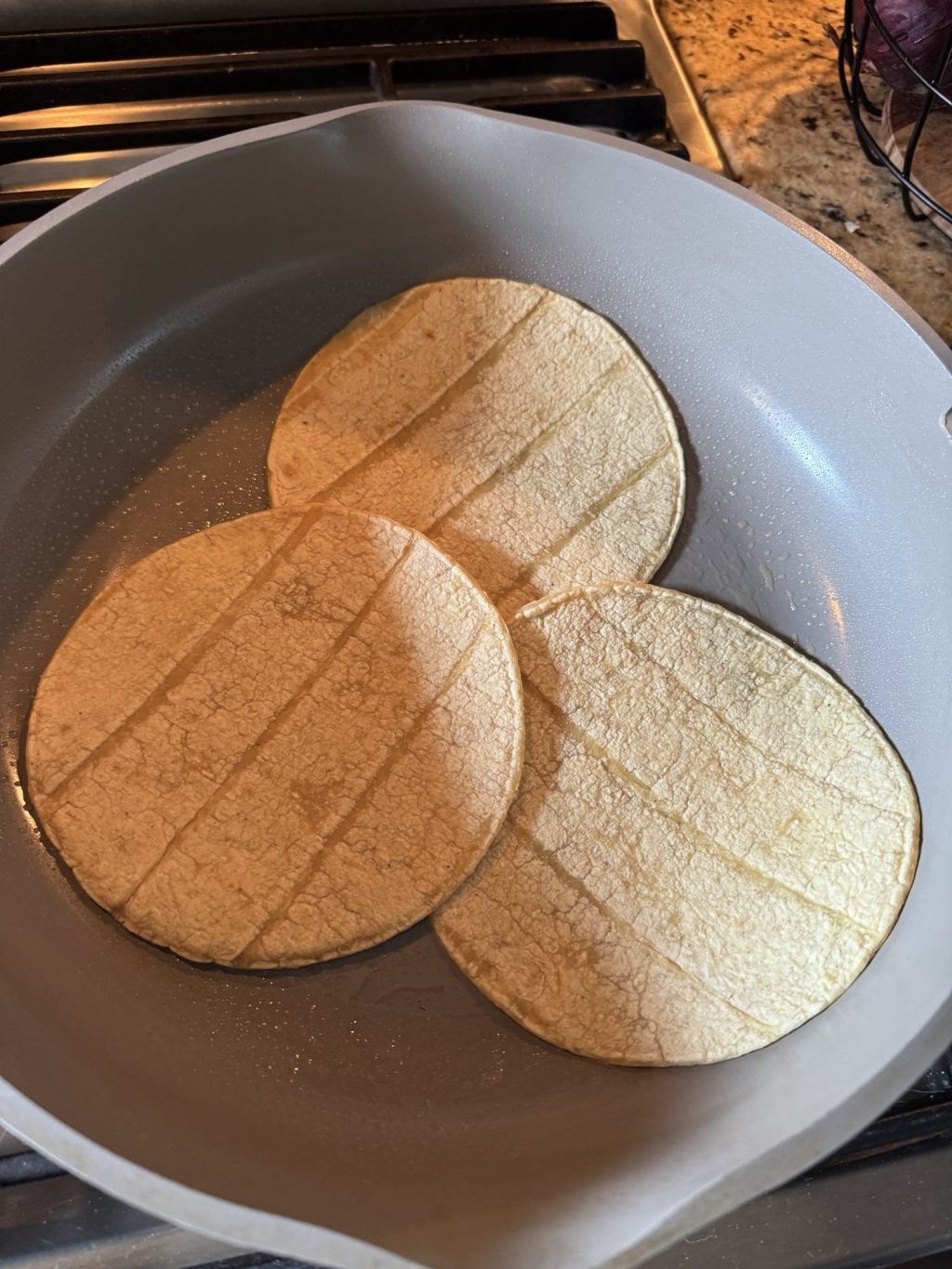 Tortillas in a pan.