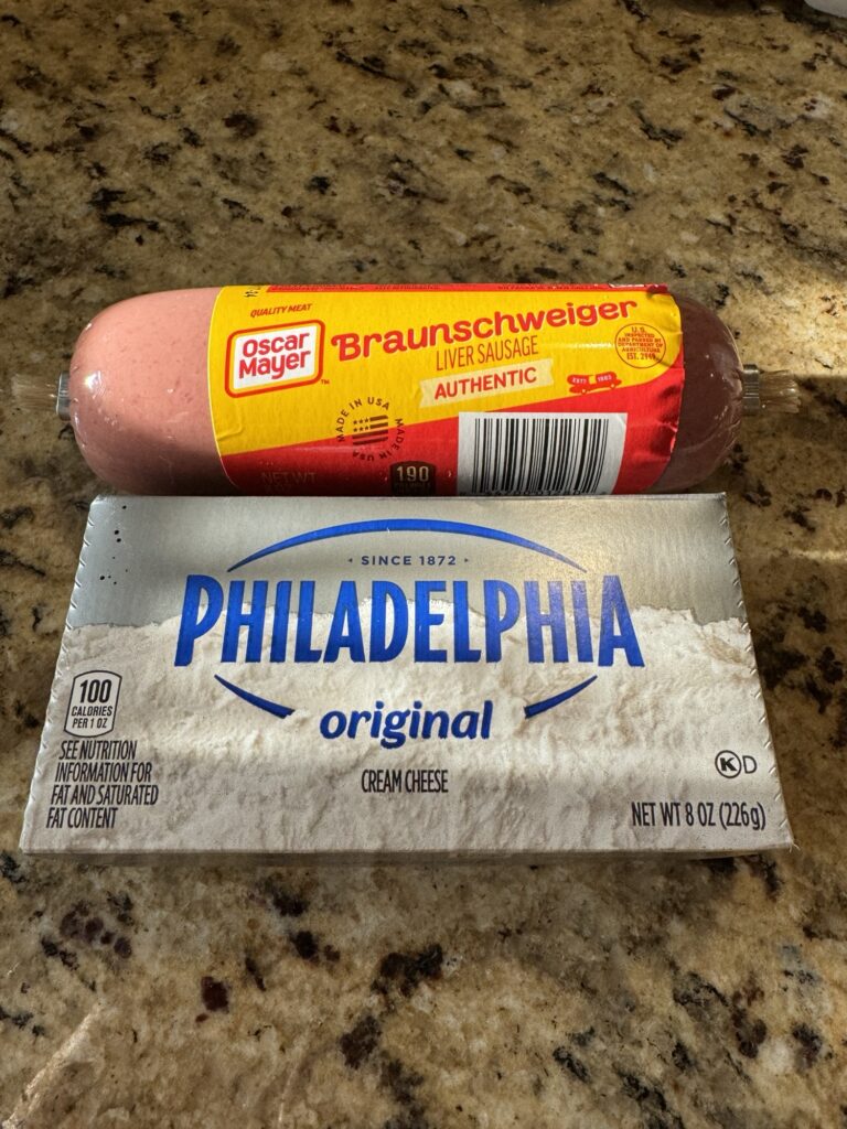 A package of Oscar Mayer Braunschweiger Liver Sausage next to a box of Philadelphia Cream Cheese.