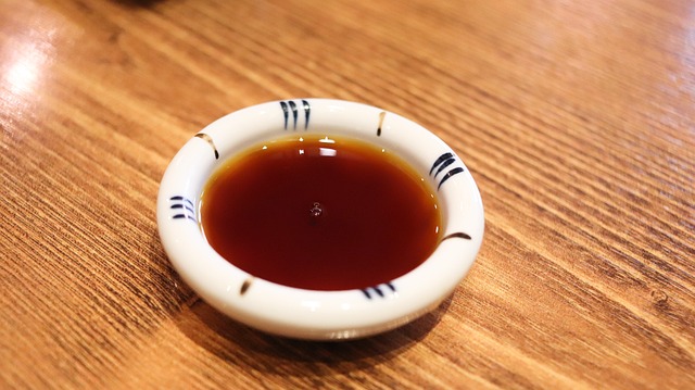 A small dish of soy sauce.
