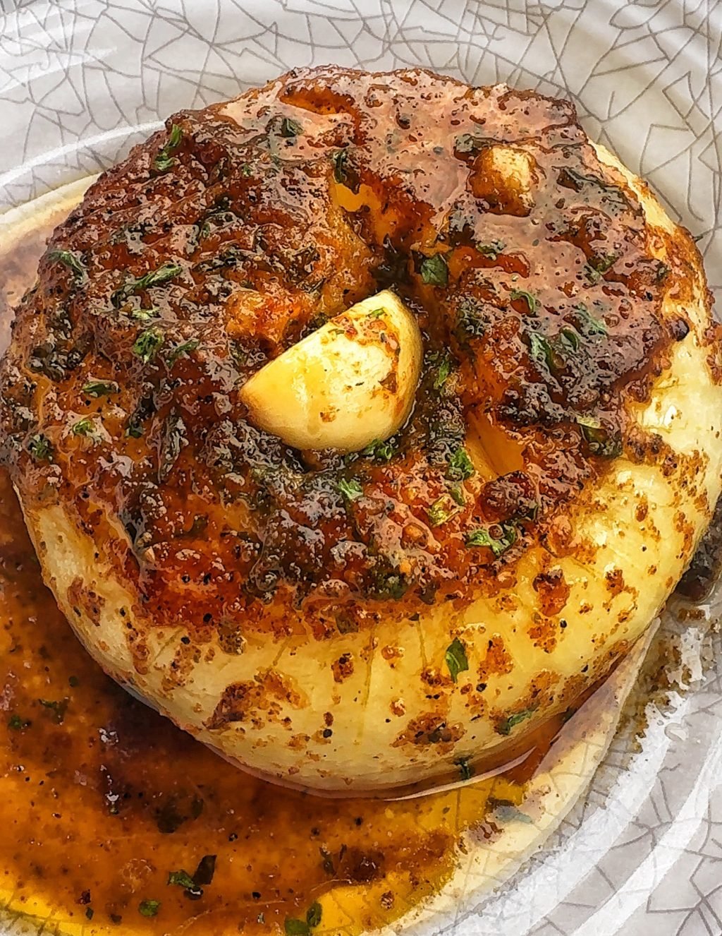 A baked and marinated onion.