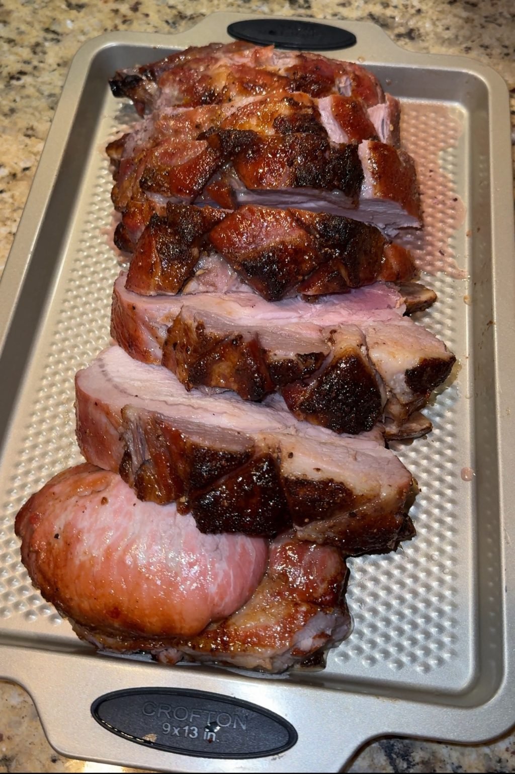 Slices of the finished crackling pork roast