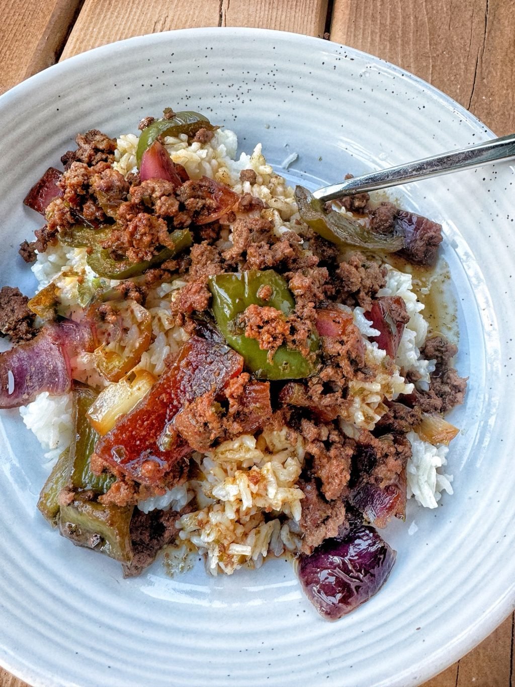 Beef and pepper skillet over rice