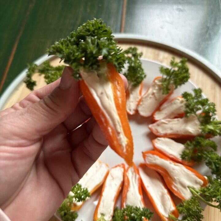 Orange peppers with cream cheese stuffing that look like carrots