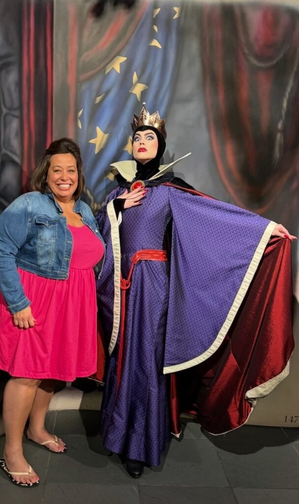 A photo of me with the Evil Queen from Sleeping Beauty at Disney