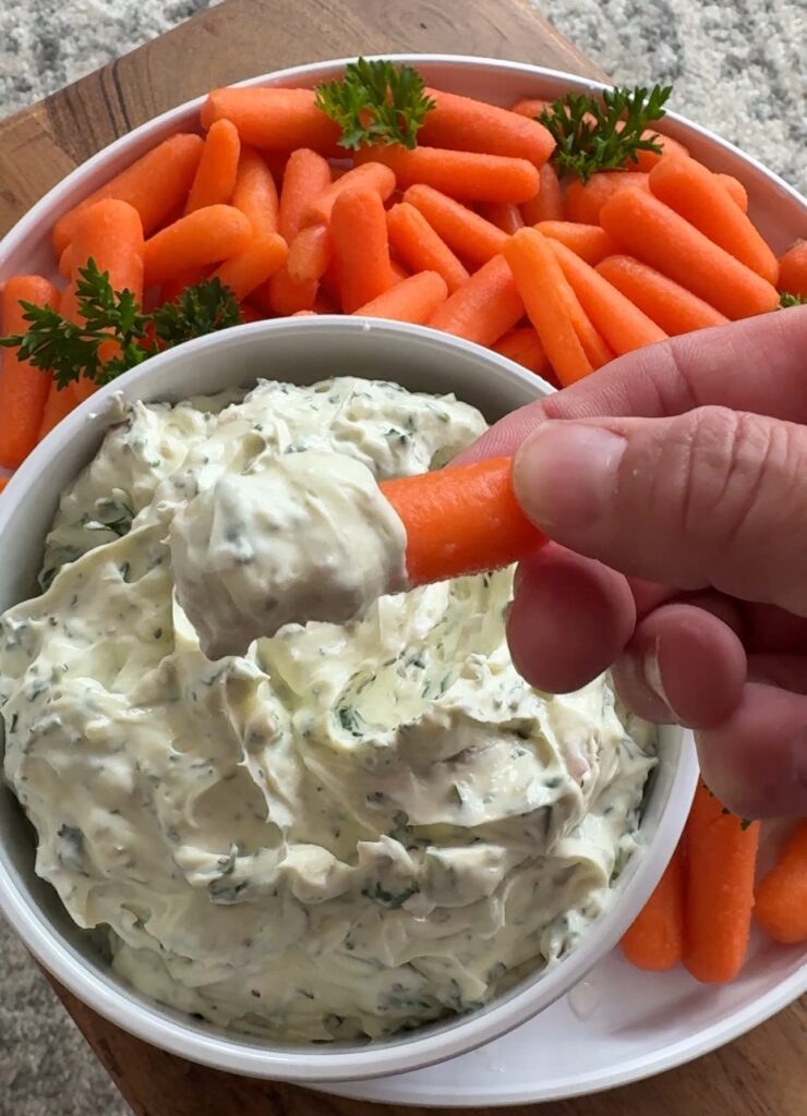 Baby carrot with the dip on it
