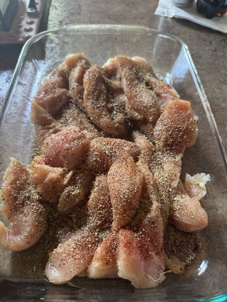 Seasoned chicken in a baking dish