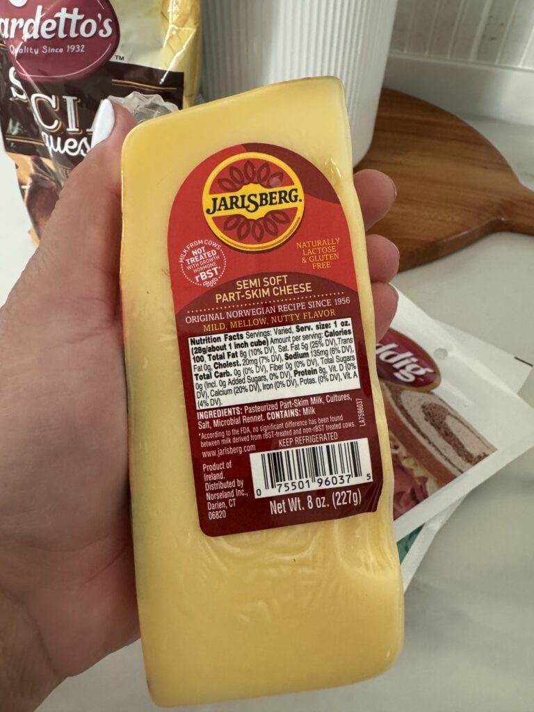 A wedge of Jarlsberg cheese